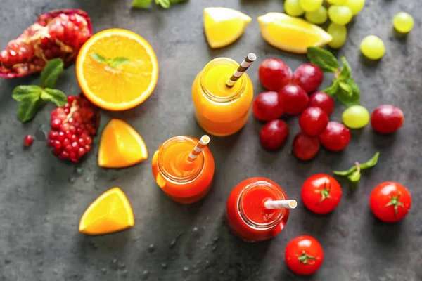 Delicious juices in bottles — Stock Photo, Image