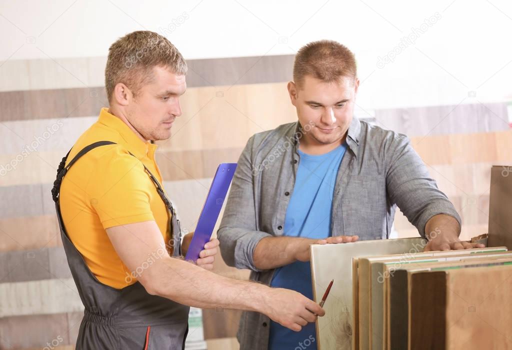 Carpenter taking order from customer