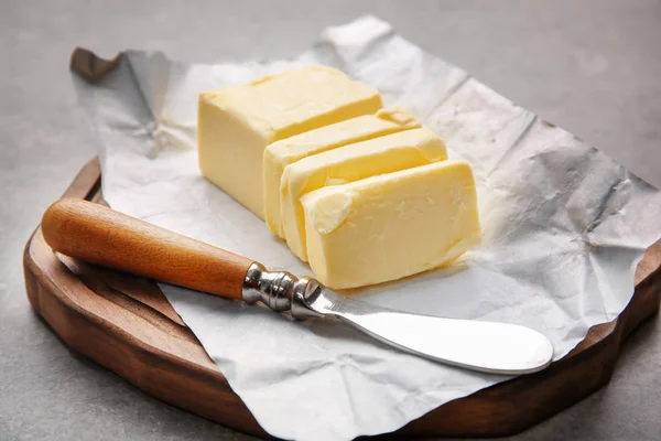 Unwrapped sliced butter — Stock Photo, Image