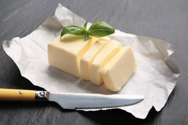 Unwrapped sliced butter — Stock Photo, Image