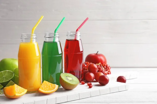 Delicious juices in bottles — Stock Photo, Image