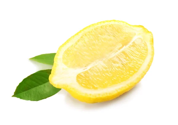 Half of fresh lemon and green leaves — Stock Photo, Image