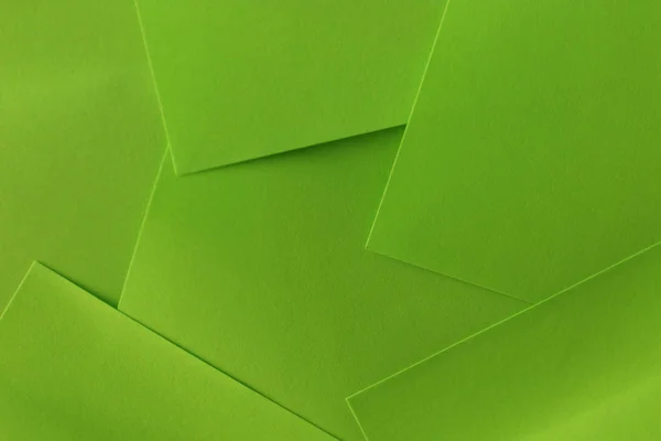 Groene vellen papier als achtergrond — Stockfoto