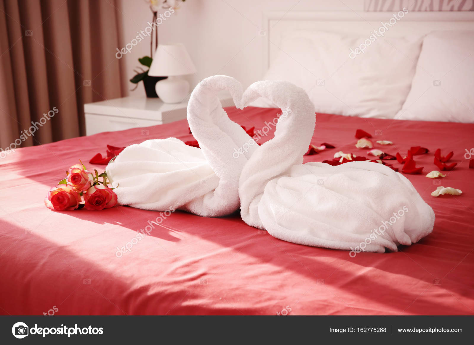 Rose Petals On Hotel Bed