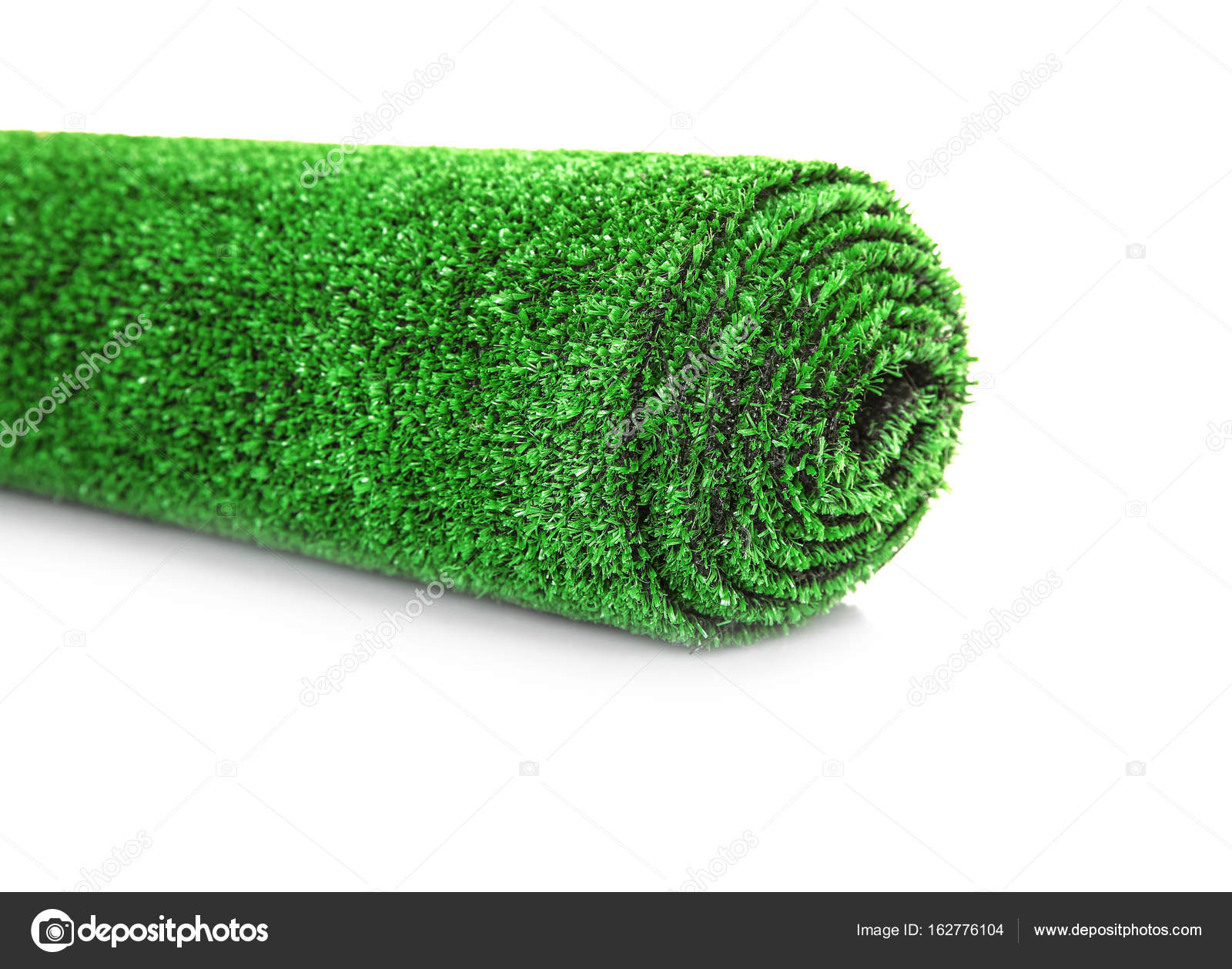 Roll Of Artificial Grass Mat On White Background Stock Photo