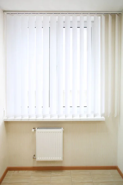 Window with white jalousie in modern apartment — Stock Photo, Image