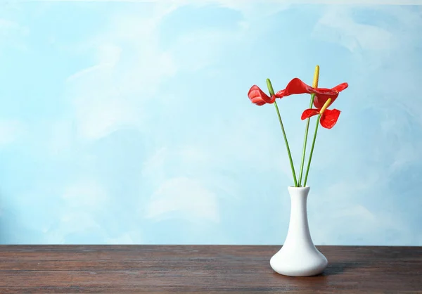 Vase with beautiful tropical flowers — Stock Photo, Image