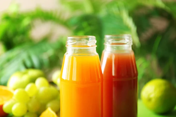 Delicious juices in bottles — Stock Photo, Image