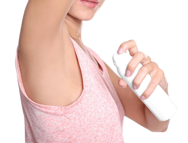 Beautiful young woman with deodorant on white background — Stock Photo, Image