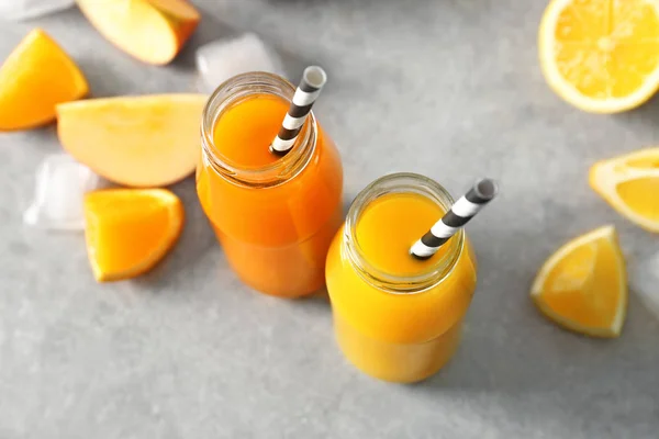 Delicious juices in bottles — Stock Photo, Image