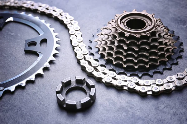 Bicycle parts on gray background — Stock Photo, Image