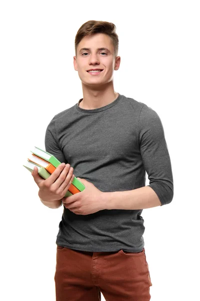 Jonge tiener jongen met boeken op witte achtergrond — Stockfoto