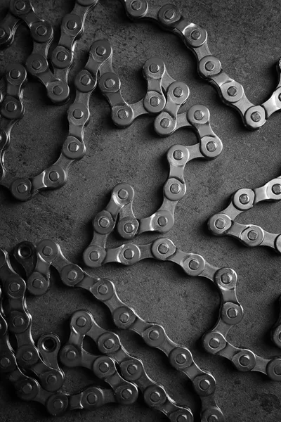 Bicycle chain on gray background — Stock Photo, Image