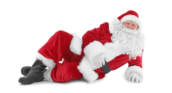 Gelukkig authentiek Kerstman liegen tegen de witte achtergrond — Stockfoto