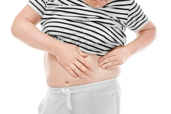 Overweight man touching his belly on white background. Diet concept — Stock Photo, Image