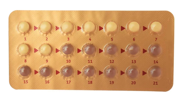 Doustnych środków antykoncepcyjnych na białym — Zdjęcie stockowe