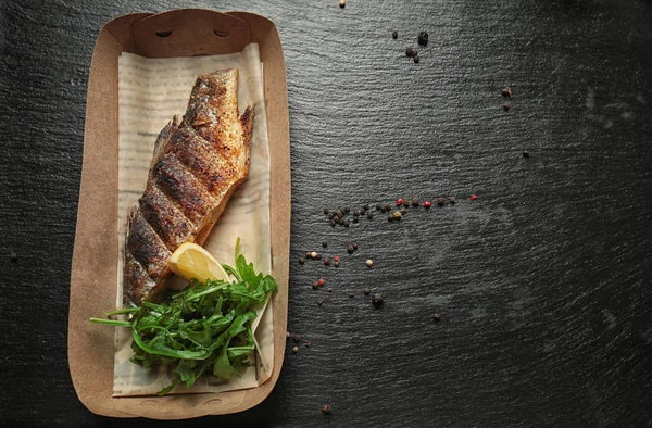 Cardboard box with delicious fish — Stock Photo, Image