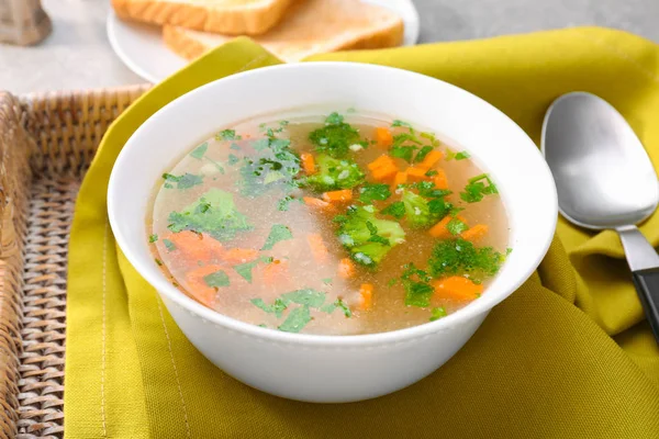 Bowl with homemade chicken soup on table — Stock Photo, Image