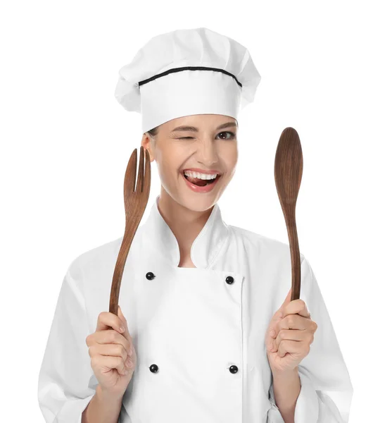 Jovem chef feminino com utensílios sobre fundo branco — Fotografia de Stock