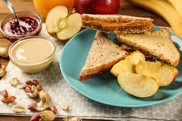peanut butter sandwiches and apple