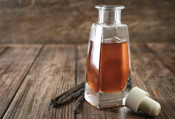 Bottle with aromatic extract — Stock Photo, Image