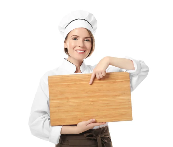 Vrouwelijke chef-kok met lege houten plank op witte achtergrond — Stockfoto