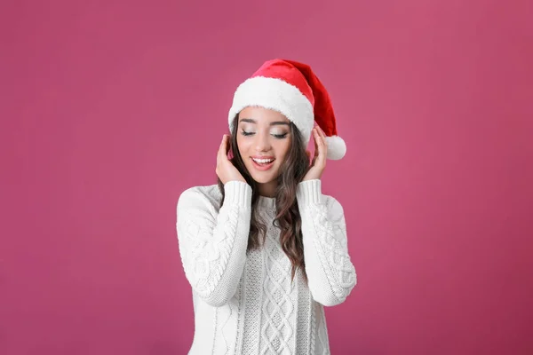 Pretty emotional lady in Christmas hat — Stock Photo, Image