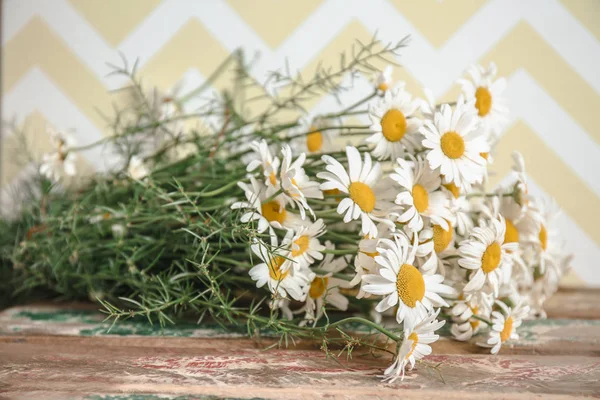 Beautiful chamomile bouquet on table — Stock Photo, Image