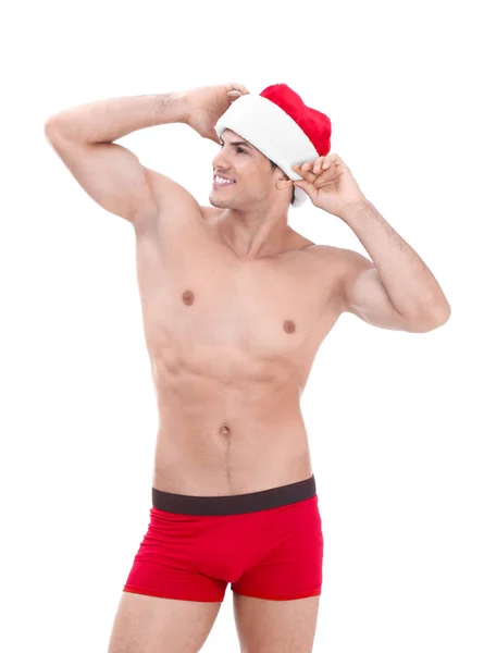 Muskel man i jul hatt på vit bakgrund — Stockfoto