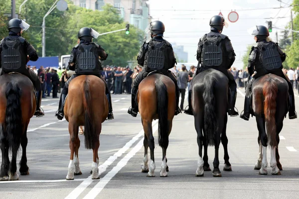 Mounted police keeping order