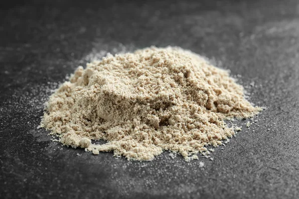 Protein powder on dark background — Stock Photo, Image