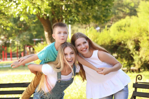 Lesbian mothers with foster son — Stock Photo, Image