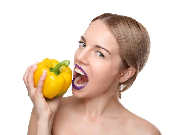 Young woman holding bell pepper — Stock Photo, Image