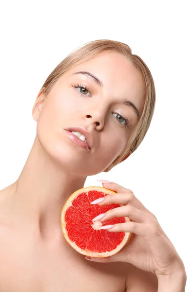 Mujer joven posando con pomelo —  Fotos de Stock