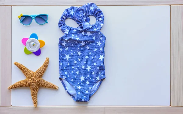 Composition with baby swimsuit — Stock Photo, Image