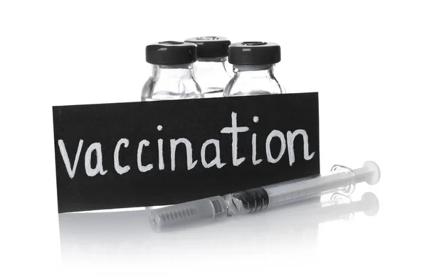 Carta nera con scritta VACCINAZIONE — Foto Stock