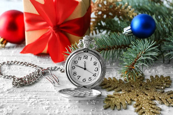 Watch and decorations on table — Stock Photo, Image