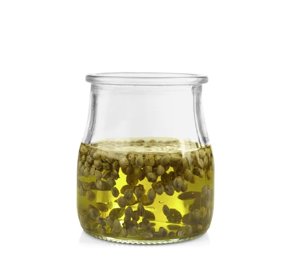 Glazen pot met hennep olie en zaden — Stockfoto
