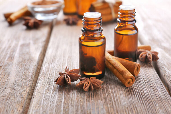 essential cinnamon oil in glass bottles 