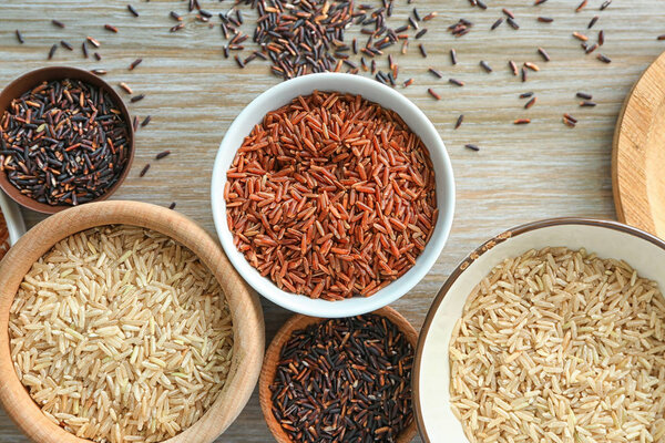 Different types of rice in bowls 