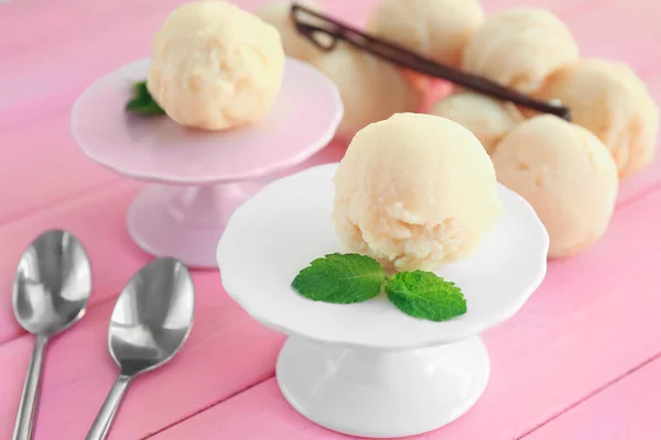 Dessert stands with delicious vanilla ice-cream balls — Stock Photo, Image