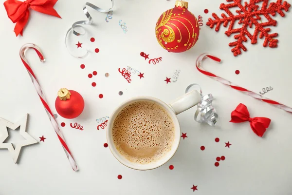 Cup of hot drink and Christmas decorations — Stock Photo, Image