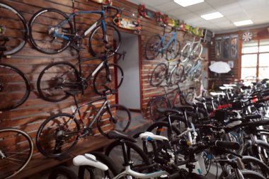 Different bicycles in shop clipart