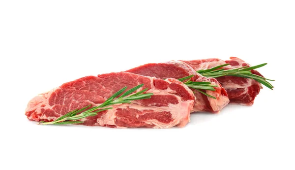Carne fresca cruda con romero — Foto de Stock