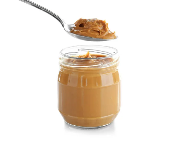 Creamy peanut butter in spoon — Stock Photo, Image