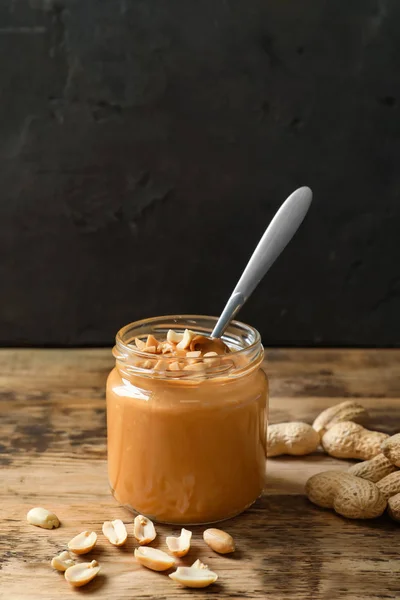 Jar with creamy peanut butter — Stock Photo, Image