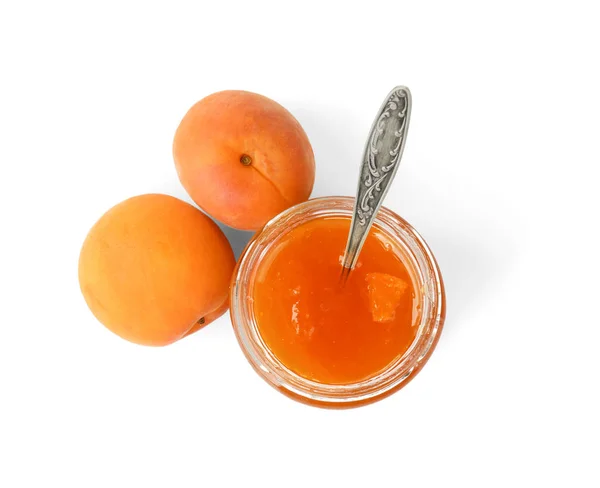 Apricot jam in jar with spoon — Stock Photo, Image