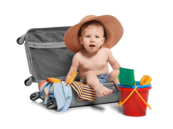 Baby sitting in suitcase on white background — Stock Photo, Image