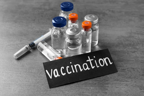 Scheda con la parola VACCINAZIONE — Foto Stock