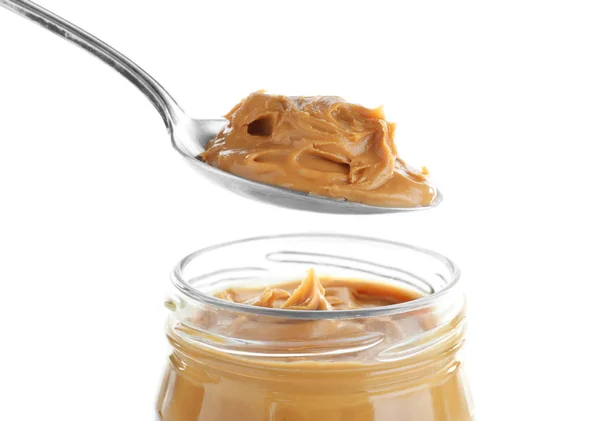 Manteiga de amendoim cremosa na colher — Fotografia de Stock